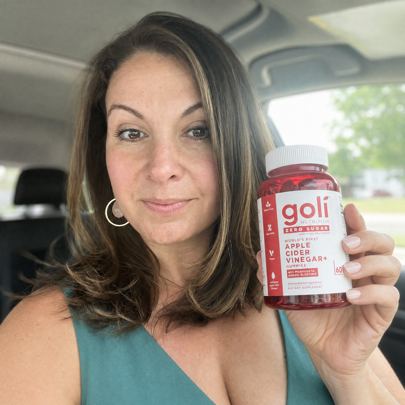 Customer holding a Goli Zero Sugar Apple Cider Vinegar+ bottle